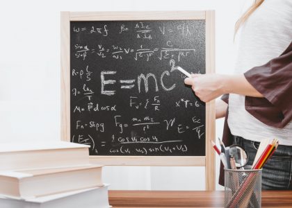 E-mc2 written on chalkboard
